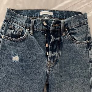 Annie Bing holes in knees boot/slight flare cropped jeans